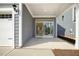 Covered back patio offers a view of the living area and a two-car garage at 472 Traditions Grande Blvd # 34, Wake Forest, NC 27587