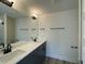 Stylish bathroom features dual sinks with matte black fixtures and ample counter space at 476 Traditions Grande Blvd # 33, Wake Forest, NC 27587