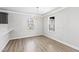 Dining room with contemporary lighting and views from the windows at 109 Lone Star Dr, Louisburg, NC 27549