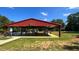 Outdoor fitness park featuring exercise equipment under a covered structure, promoting an active lifestyle at 109 Lone Star Dr, Louisburg, NC 27549
