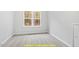 Bright bedroom with window and neutral colored carpet at 169 Running Deer Dr, Louisburg, NC 27549