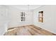 Cozy dining area with a modern chandelier and natural light at 169 Running Deer Dr, Louisburg, NC 27549