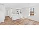 Bright open concept dining area with hardwood flooring and modern chandelier at 169 Running Deer Dr, Louisburg, NC 27549