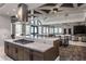 Modern community kitchen with stainless steel appliances and island at 2301 Beeblossom Pl, Fuquay Varina, NC 27526