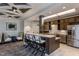 Well-equipped community kitchen with modern appliances and bar seating at 2301 Beeblossom Pl, Fuquay Varina, NC 27526
