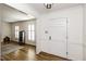 Bright foyer with hardwood floors, white trim, and a glimpse into the living area, creating an open feel at 3540 Chelsea Dr, Rocky Mount, NC 27803