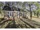 Well-maintained brick home with black shutters and lush landscaping in the front yard at 3540 Chelsea Dr, Rocky Mount, NC 27803