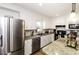 Well-lit kitchen boasts granite countertops, stainless steel appliances, and ample cabinet space at 3540 Chelsea Dr, Rocky Mount, NC 27803