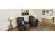 Cozy living room featuring hardwood floors, neutral walls, and comfortable seating, creating a relaxing space at 3540 Chelsea Dr, Rocky Mount, NC 27803