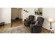 Inviting living room with hardwood floors, neutral decor, and a comfortable seating area at 3540 Chelsea Dr, Rocky Mount, NC 27803