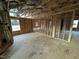 Unfinished bedroom with one window and hardwood floors at 9133 Phoenix Ct, Spring Hope, NC 27882