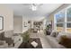 Inviting open-concept living room seamlessly connects to dining and kitchen areas, perfect for modern living at 9133 Phoenix Ct, Middlesex, NC 27557