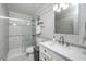Stylish bathroom with tiled walls, a modern vanity, and a glass-enclosed shower at 1320 S State Street # D, Raleigh, NC 27610