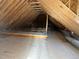 Unfinished attic space showing the wooden frame construction at 142 Batten Hill Ln, Selma, NC 27576