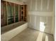 The unfinished primary bathroom with a large tub and plumbing fixtures at 142 Batten Hill Ln, Selma, NC 27576