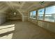 An unfinished room with natural light shows the large size and scope of what it can become at 142 Batten Hill Ln, Selma, NC 27576