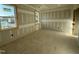 A bedroom is under construction with windows showing ample light and beautiful views outside at 142 Batten Hill Ln, Selma, NC 27576