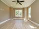 Bright bedroom with two windows at 142 Batten Hill Ln, Selma, NC 27576