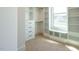 Spacious walk-in closet with custom shelving and drawers, window view at 142 Batten Hill Ln, Selma, NC 27576