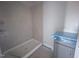 Bathroom featuring a tile shower and modern vanity at 1901 Old Bramble Ln # 3, Fuquay Varina, NC 27526