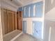 Bathroom under construction, showcasing drywall work, unfinished floors, and a ready to be installed shower at 1901 Old Bramble Ln # 3, Fuquay Varina, NC 27526