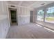 Unfinished bedroom, features drywall, exterior view, and passageways ready for completion and personalization at 1901 Old Bramble Ln # 3, Fuquay Varina, NC 27526