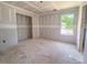 Bedroom with a large window at 1901 Old Bramble Ln # 3, Fuquay Varina, NC 27526