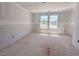 Bedroom with two windows allowing for plenty of natural light at 1901 Old Bramble Ln # 3, Fuquay Varina, NC 27526