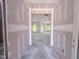 Entryway under construction showing the unfinished interior, natural light, and open floor plan at 1901 Old Bramble Ln # 3, Fuquay Varina, NC 27526