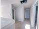 Bright hallway featuring crisp white walls and trim leading to different rooms at 1901 Old Bramble Ln # 3, Fuquay Varina, NC 27526