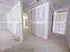 Hallway with doorways leading to various rooms, providing smooth traffic flow at 1901 Old Bramble Ln # 3, Fuquay Varina, NC 27526