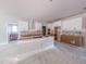 Bright kitchen with white cabinets and an island, awaiting finishing touches for a modern appeal at 1901 Old Bramble Ln # 3, Fuquay Varina, NC 27526