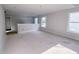 Spacious living area with ample natural light and neutral paint, ready for customization at 1901 Old Bramble Ln # 3, Fuquay Varina, NC 27526