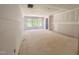 Spacious living room under construction, featuring multiple windows and unfinished flooring, ready for personalization at 1901 Old Bramble Ln # 3, Fuquay Varina, NC 27526