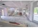 Spacious living room featuring a fireplace and staircase ready for finishing touches at 1901 Old Bramble Ln # 3, Fuquay Varina, NC 27526