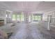 The bright living room during construction features drywall work, unfinished floors, and lots of natural light at 1901 Old Bramble Ln # 3, Fuquay Varina, NC 27526