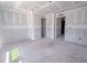 Spacious living room featuring unfinished walls and floors during construction at 1901 Old Bramble Ln # 3, Fuquay Varina, NC 27526