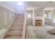 Staircase in a spacious living room ready for the final steps at 1901 Old Bramble Ln # 3, Fuquay Varina, NC 27526