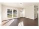 Inviting living room with large windows and wood-look flooring at 3015 E Brinkley Dr, Spring Lake, NC 28390