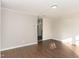 Bright living room with modern flooring, neutral paint, and simple trim at 3015 E Brinkley Dr, Spring Lake, NC 28390