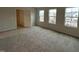 This spacious bedroom offers plenty of natural light and neutral carpeting for a relaxing feel at 50 Calabria Ct, Franklinton, NC 27525
