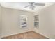 Cozy bedroom with two windows, ample natural light and neutral walls for a relaxing atmosphere at 526 Elm Ave, Wake Forest, NC 27587