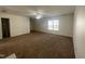 Spacious bedroom with carpet, ceiling fan and adjacent bathroom at 526 Elm Ave, Wake Forest, NC 27587