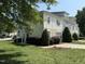 Charming townhouse with well-manicured landscaping and inviting front entrance at 526 Elm Ave, Wake Forest, NC 27587