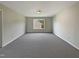 Neutral colored bedroom with carpet flooring and natural light from the window at 6 Heatherford Ct, Durham, NC 27704