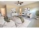 Main bedroom with sitting area, en-suite bath and neutral tones at 8817 Melvin St # 27, Willow Springs, NC 27592