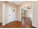 Bright entryway with hardwood floors and view to living room at 15 Rolling Meadows Ln, Chapel Hill, NC 27517