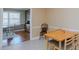 Bright dining room with built-in wooden cabinet and traditional decor for Gathering meals and entertaining at 2434 Orice St, Burlington, NC 27215