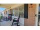 Inviting front porch with rocking chairs, offering a cozy space to relax and enjoy the neighborhood view at 2434 Orice St, Burlington, NC 27215