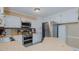 Bright kitchen features stainless steel appliances, a breakfast bar, and plenty of cabinet space at 2434 Orice St, Burlington, NC 27215